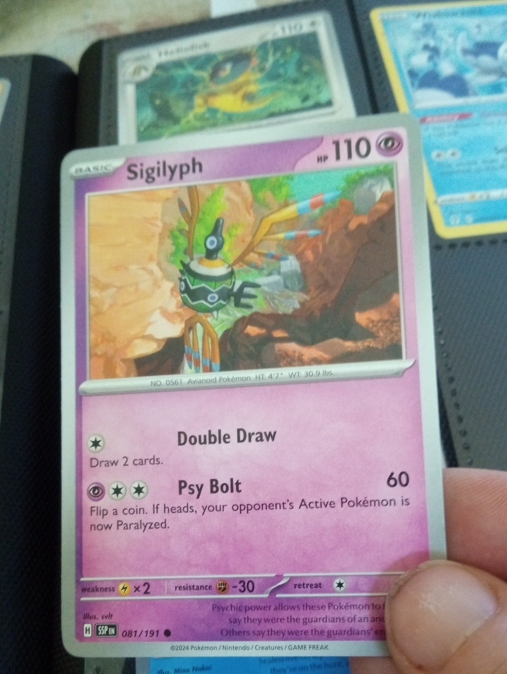 Pokémon Sigilyph Card - Pink / Purple Border
